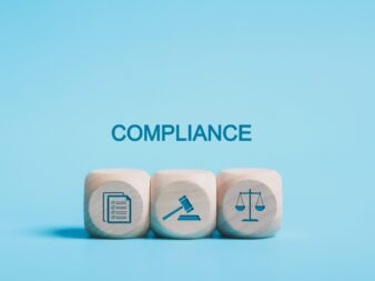 Compliance,In,Business,Concept.,Compliance,Icon,On,Wooden,Blocks.,Ensuring